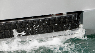 Illustration for article titled Retractable Tank Treads Make this Amphibious Boat Ready For Beach Assaults